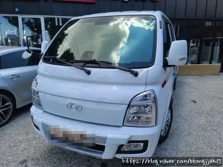 포항 경주 포터2 SPI 포커스 F7 전면 썬팅 및 전후방 2채널 눈미러형 블랙박스 시공 / 포항, 경주 시공 사진