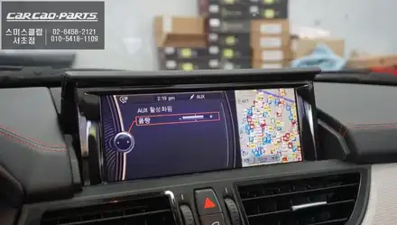 BMW Z4차량 음성과 조그다이얼로 제어할 수 있는 카플레이 모듈및 후방카메라 장착. / 서초구 서초동 시공 사진