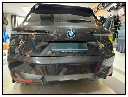 bmw ix xdrive40 차량에 블랙 ix m60 레터링 부착으로 업그레이드해 보자^^ / 동대문구 장안동 시공 사진