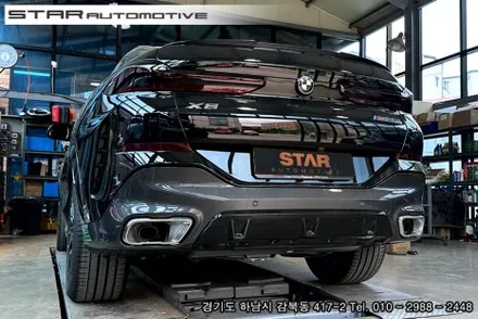 BMWG06 X6 M60i 블랙 머플러팁 장착