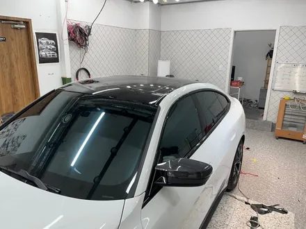 하남 DK아지트 BMW i4 고광택 LB필름 피아노블랙  랩핑 루프스킨시공_고광택필름_LB필름시공_남양주루프스킨_강동루프스킨 / 하남 풍산동