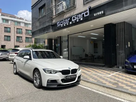 우글거리는 필름 제거하고 쾌적한 후방시야 확보 - BMW 320d 투어링(F31) 썬팅 재시공, 솔라가드프리미엄 퀀텀 / 고양 덕양구 원흥동