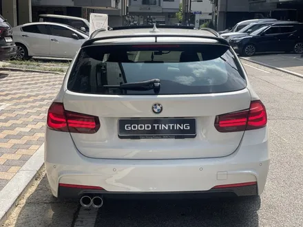 우글거리는 필름 제거하고 쾌적한 후방시야 확보 - BMW 320d 투어링(F31) 썬팅 재시공, 솔라가드프리미엄 퀀텀 / 고양 덕양구 원흥동