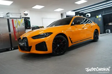 BMW i4 M50 전체랩핑 시공, 오렌지 컬러의 존재감은 그대로 광교랩핑전문업체 제이와이드 / 경기 수원 영통