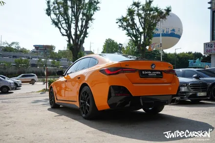 BMW i4 M50 전체랩핑 시공, 오렌지 컬러의 존재감은 그대로 광교랩핑전문업체 제이와이드 / 경기 수원 영통