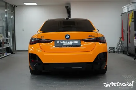 BMW i4 M50 전체랩핑 시공, 오렌지 컬러의 존재감은 그대로 광교랩핑전문업체 제이와이드 / 경기 수원 영통