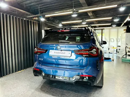 BMW iX3 블랙팩 프론트립 + 스포일러.