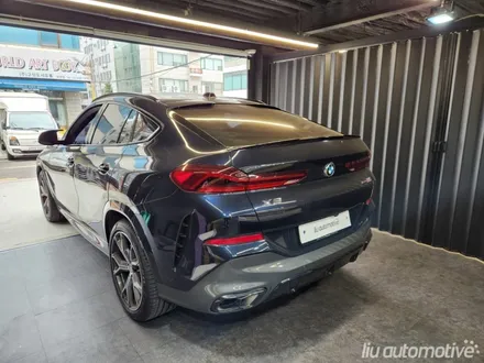 BMW X6 블랙팩 퍼포먼스 파츠 교체 시공 작업.