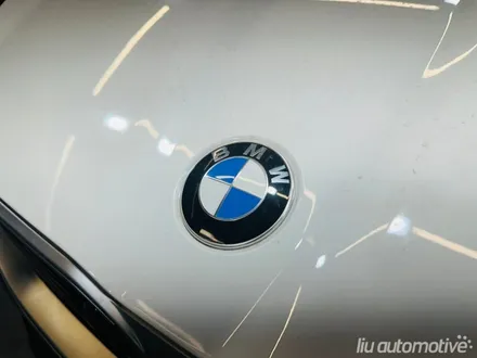 BMW U10 X2 50주년 정품 엠블럼 교체.
