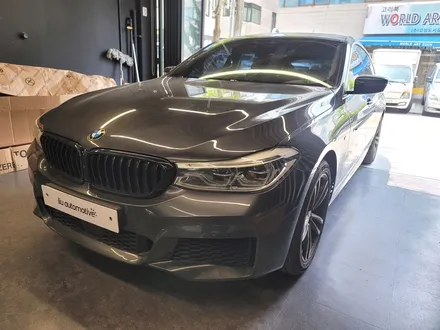 BMW 6GT 카본 프론트립. 비포 애프터가 확실한 편.