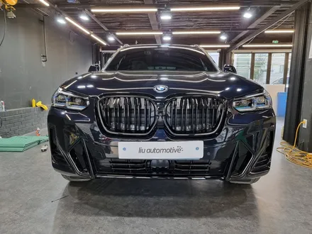 BMW iX3 그릴 교체 + 선쉐이드 시공 설치.