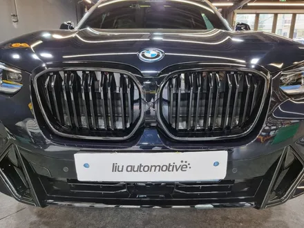 BMW iX3 그릴 교체 + 선쉐이드 시공 설치.