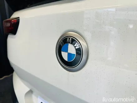 BMW U10 X2 50주년 정품 엠블럼 교체.