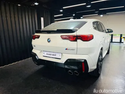 BMW U10 X2 50주년 정품 엠블럼 교체.