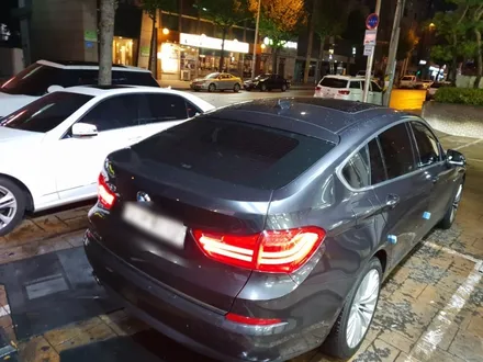 BMW 5GT 순수 국산제품 안드로이드 셋탑형 네비게이션 모토로이드 장착 - 오토갤러리 송파 제주 마천 위례
