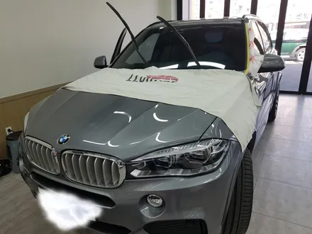 BMW X5. 전면썬팅.기존(필름)제거 후.루마썬팅 전면 피너쿨 썬팅