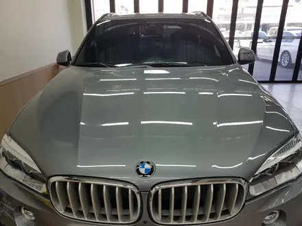 BMW X5. 전면썬팅.기존(필름)제거 후.루마썬팅 전면 피너쿨 썬팅