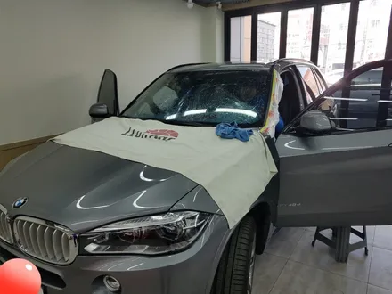 BMW X5. 전면썬팅.기존(필름)제거 후.루마썬팅 전면 피너쿨 썬팅