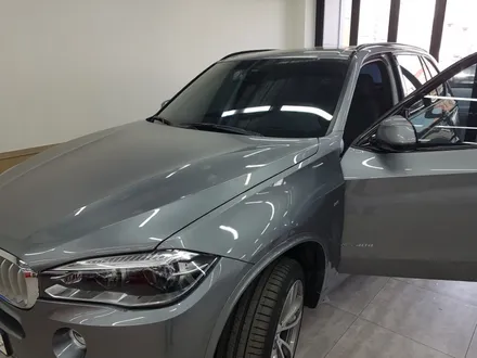 BMW X5. 전면썬팅.기존(필름)제거 후.루마썬팅 전면 피너쿨 썬팅