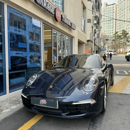 포르쉐 911 신형포르쉐베이지열선정품핸들로 작업을 하였습니다 / 서울 용산 중구