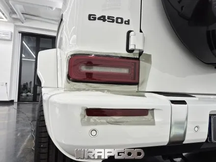 검단 벤츠 G450d 나이트패키지(라이트필름,도강라인,사이드스텝,사이드미러,스패어타이어커버 범퍼부분,그릴,엠블렘블랙)시공 / 김포 양촌읍