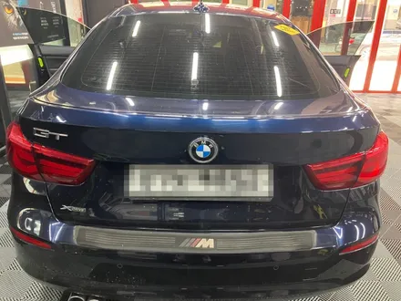 에스튠(아이나비 수원광교점) - BMW 3GT__아이나비 QXD2 블랙박스와 케어셀15A 보조배터리 / 경기 수원 영통