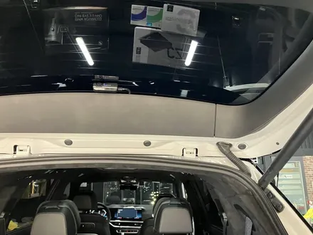 에스튠(아이나비 수원광교점) - BMW X7__아이나비 퀀텀3+커넥티드 + 보조배터리 장착 / 경기 수원 영통
