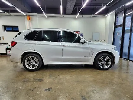 BMW X5 블랙PPF루프스킨+크롬죽이기+사이드미러교체+그릴교체 / 수원시 영통구 이의동
