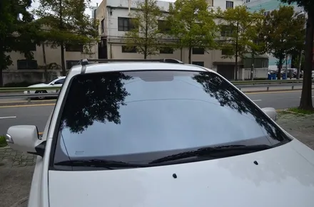 부산 전면썬팅 어보브 크롬하츠블루 그랜드카니발 시공