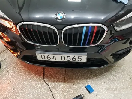제이엠커스텀) BMW X1 부분랩핑 (프론트 디퓨저+리어디퓨저) 블랙유광작업 / 구리시 갈매동