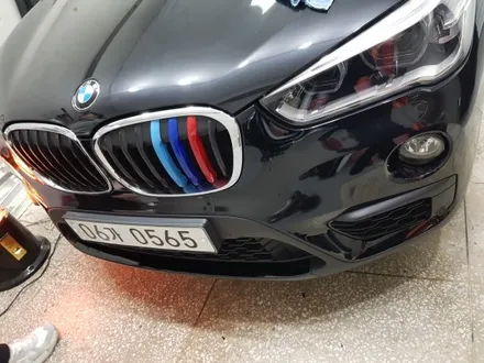 제이엠커스텀) BMW X1 부분랩핑 (프론트 디퓨저+리어디퓨저) 블랙유광작업 / 구리시 갈매동